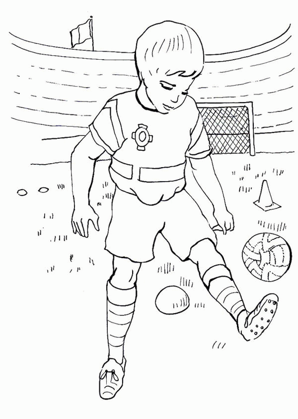 A Boy Practising His Soccer Move in the Stadium Coloring Page