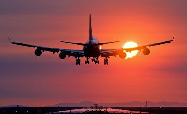 Aeroplane landing at sunset, Canada � Scout Network Blog