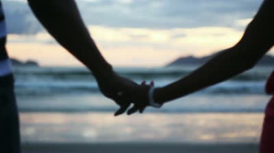 Couple Holding Hands At Sunset Silhouetted Stock Footage Video 