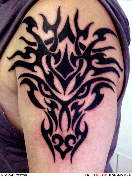 Shoulder tattoo tribal dragon Tribal dragon