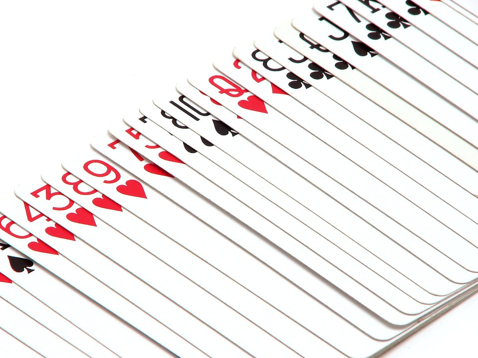 Free Stock Photos | Playing cards fanned out on a white background 