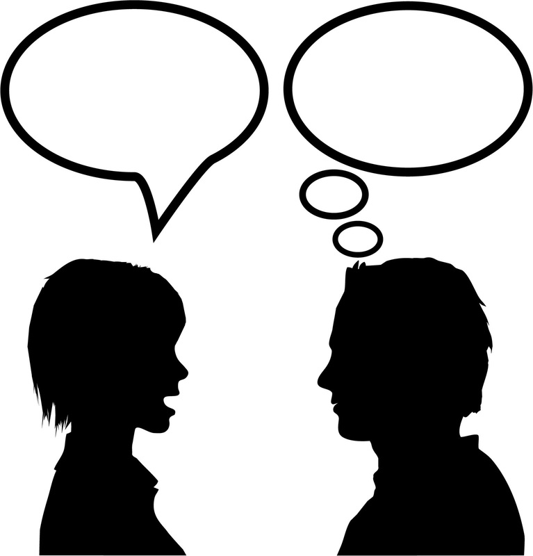 two people talking face to face