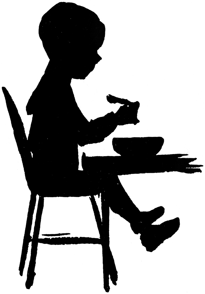 Boy Sitting in Highchair  Eating