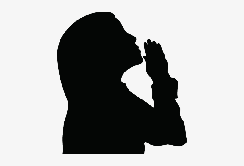 Silhouette of a person praying with hands clasped and head tilted upward in devotion.