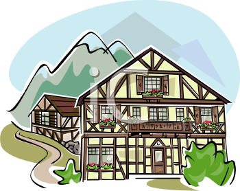 Traditional Alpine chalet with timber framing, flower boxes, and mountain backdrop.