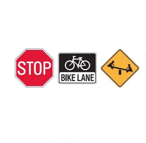 Three road signs: red octagonal STOP sign, black-and-white BIKE LANE sign, and yellow diamond-shaped seesaw warning sign.