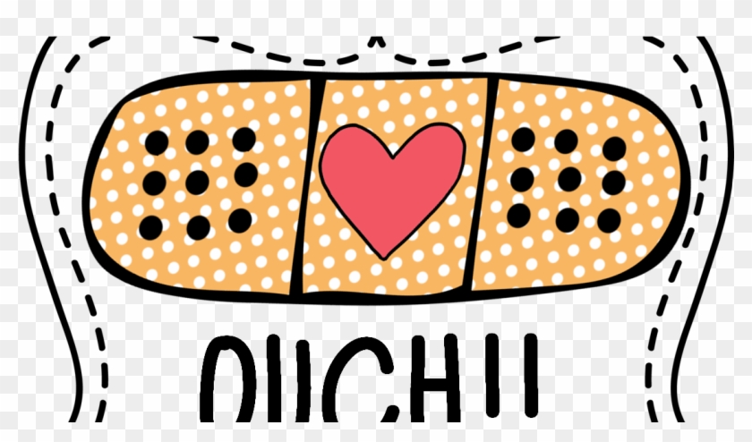 Illustrated bandage with polka dots, a red heart in the center, and stitched edges; text "OUCH!!" below.