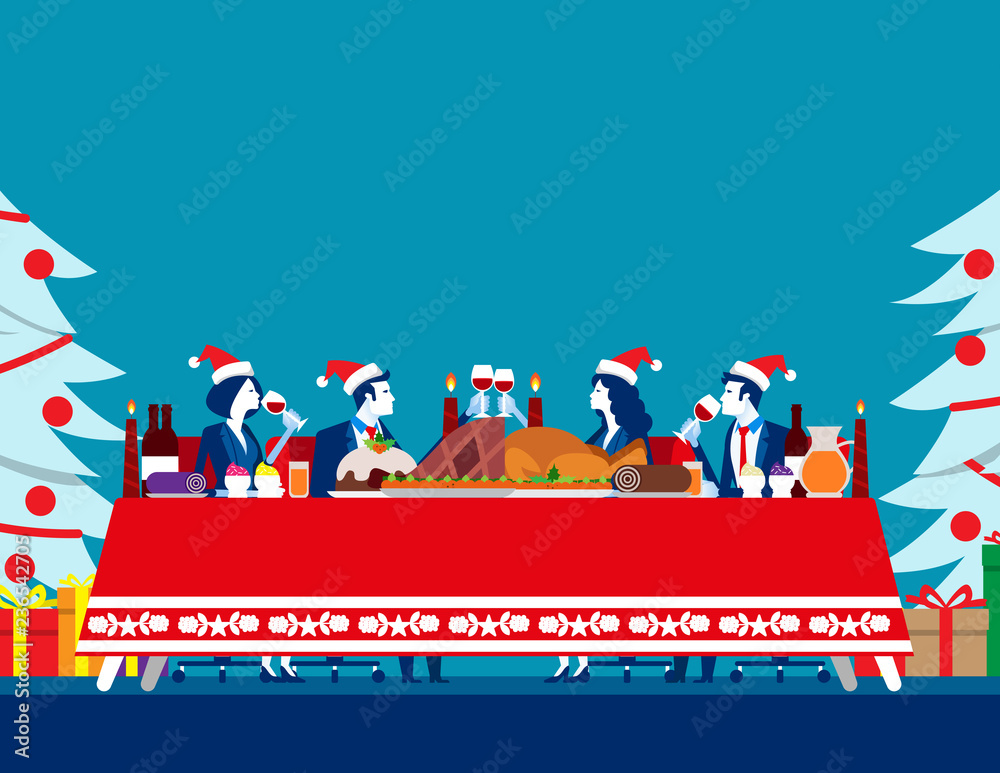 Five people in Santa hats enjoy a festive Christmas dinner with roast turkey, wine, and candles at a decorated table.