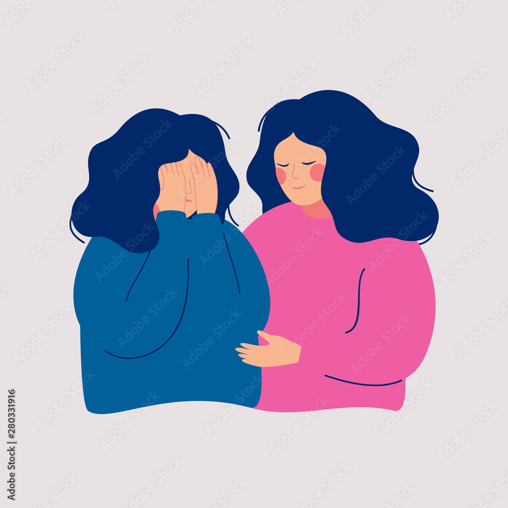 A woman in pink comforts another woman in blue who covers her face with her hands, conveying empathy and emotional support.