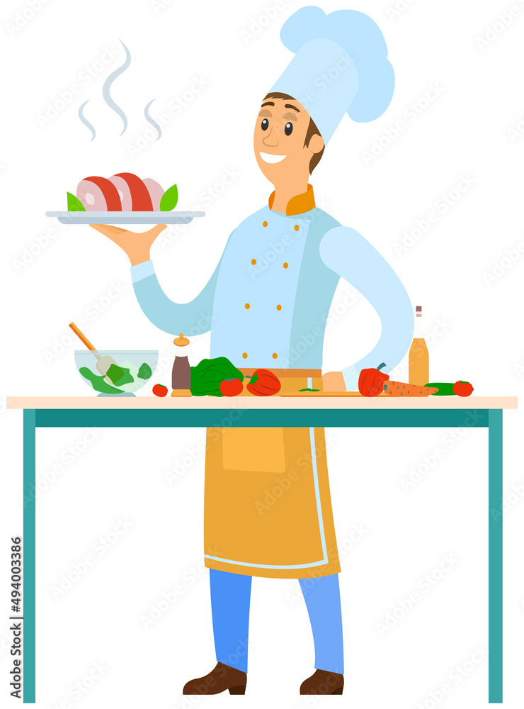Smiling chef in blue uniform and tall hat presenting a steaming platter of sliced meat with fresh vegetables on counter.