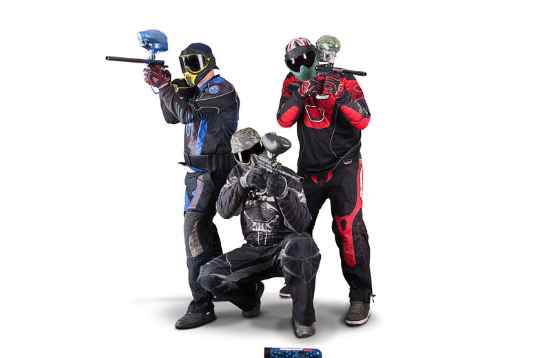 Four paintball players in full gear posing dynamically with markers against a white background.