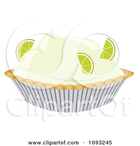 Key lime pie cupcake with creamy filling, lime slices, and striped paper liner.