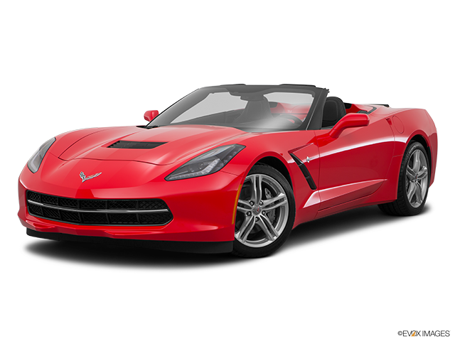 Red 2016 Chevrolet Corvette Stingray convertible with black soft top and silver alloy wheels, front three-quarter view.