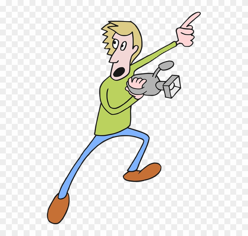 Cartoon man with blond hair, green shirt, holding a camcorder and pointing excitedly.