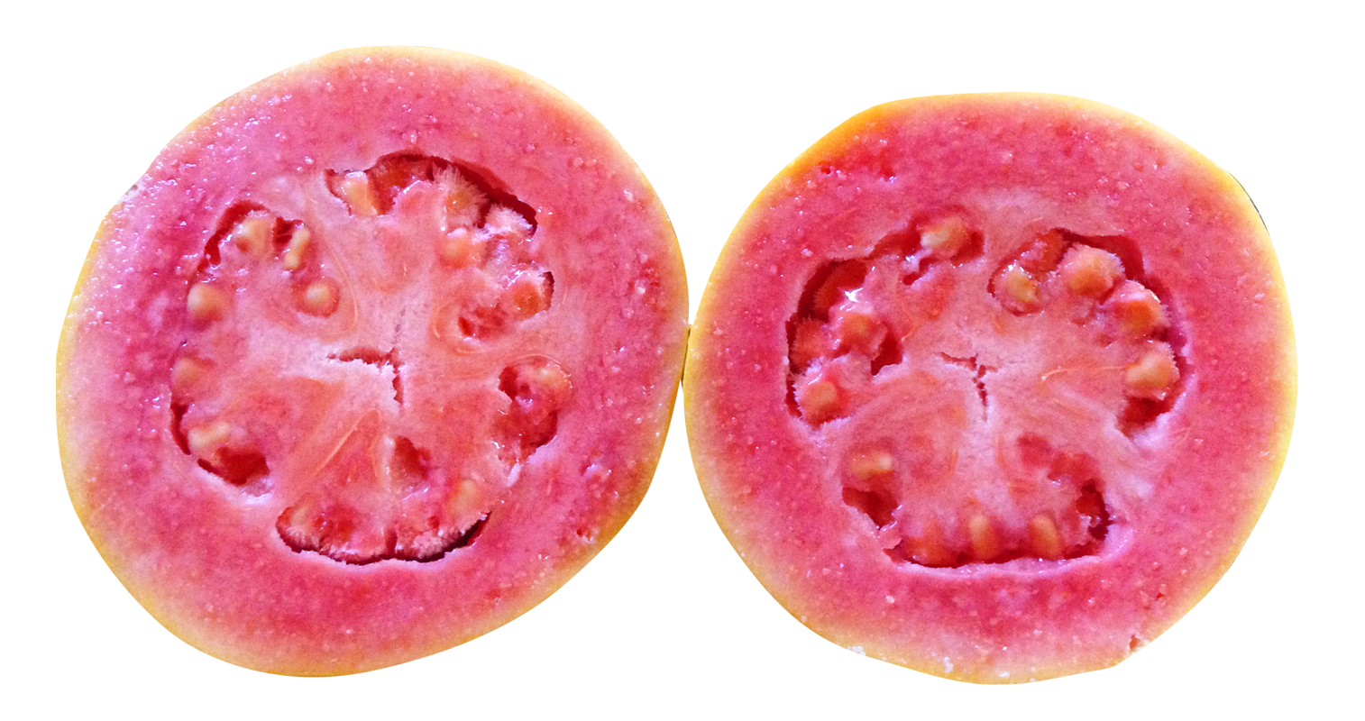 Cross-section of a ripe pink guava showing juicy flesh, seeds, and star-shaped core.