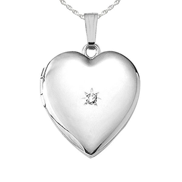 Polished silver heart-shaped locket pendant with a small central diamond, attached to a delicate chain.