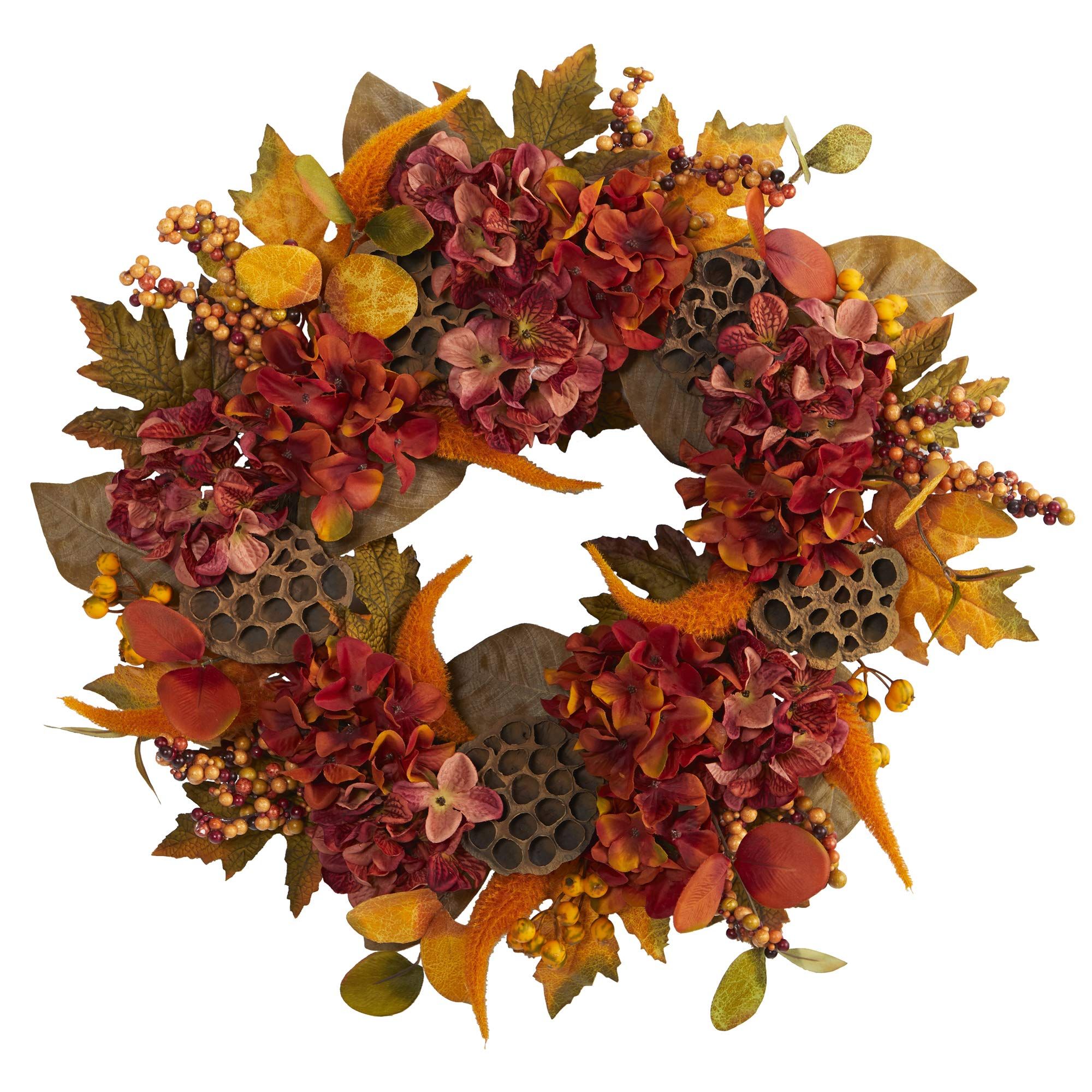 Autumn wreath with red hydrangeas, orange berries, maple leaves, and lotus pods on a white background.
