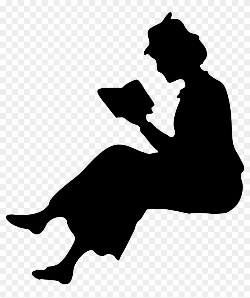 Silhouette of a person sitting cross-legged, reading a book with focused posture.