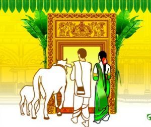 A couple in traditional Indian attire stands before an ornate doorway with two white cows, flanked by palm leaves and festive decorations.