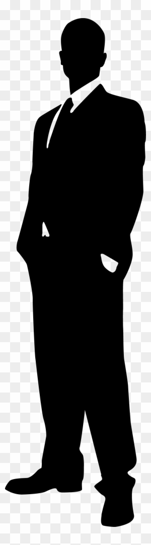 Silhouette of a man in a formal suit standing with hands in pockets, facing forward.