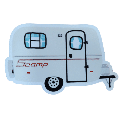 White vintage-style Scamp travel trailer with blue curtains, red stripe, and side-mounted propane tank.