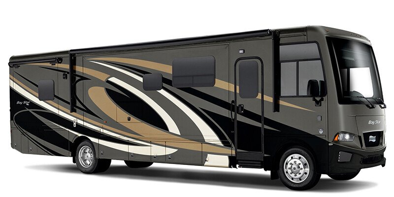 Gray and black Class A motorhome with tan and white swirl graphics, side slide-outs extended, modern front cab design.