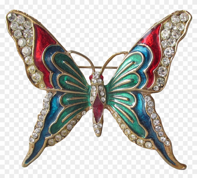 Vintage butterfly brooch with red, green, and blue enamel wings adorned with clear rhinestones on gold-tone metal.