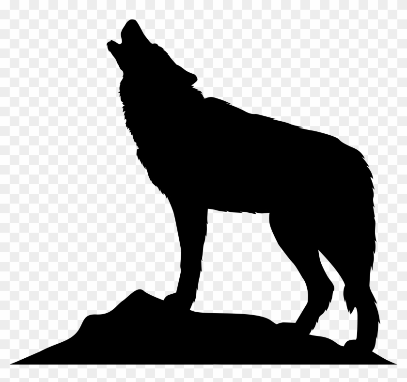 Silhouette of a howling wolf standing on a rocky outcrop against transparent background.
