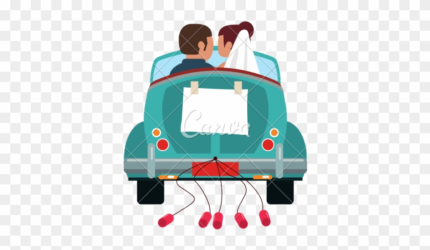 Wedding couple in a vintage teal car with "Just Married" sign and cans trailing behind.