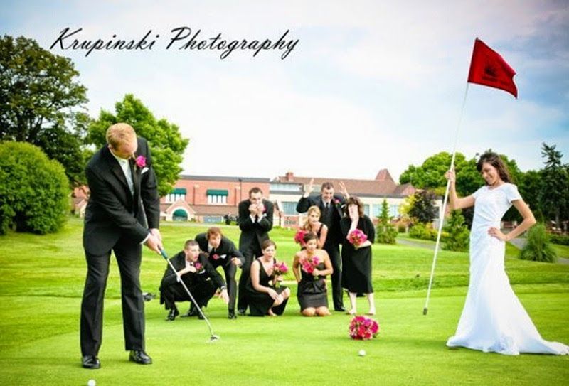 Groom putting on a golf course while bride holds flag; wedding party poses playfully in background.