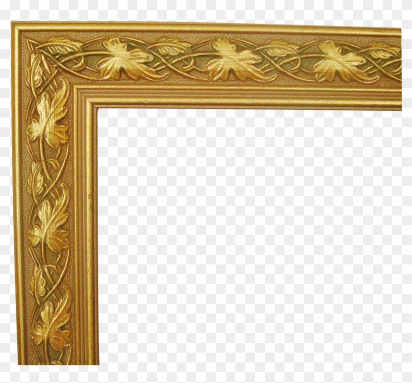 Ornate gold picture frame corner with carved leaf and vine motifs on a transparent background.