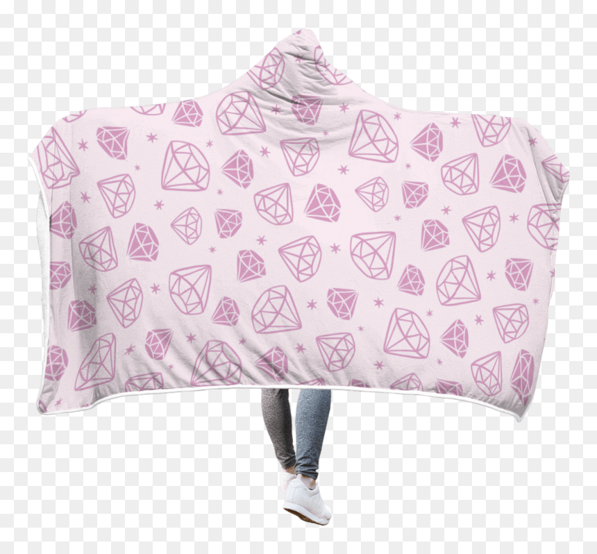 Person wearing a light pink hooded blanket with purple diamond and star pattern, paired with jeans and white sneakers.