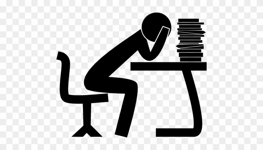 Person slumped at desk with head in hand, overwhelmed by tall stack of books or papers.