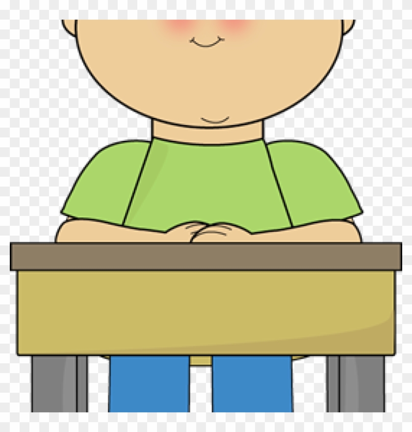 boy sitting at desk clipart