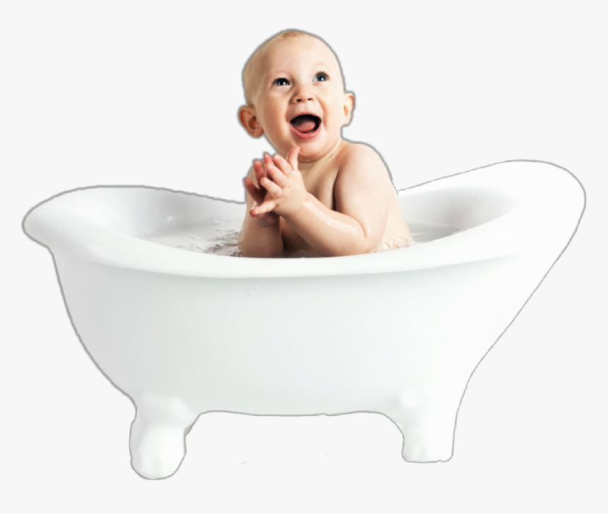 Happy baby laughing in a white clawfoot bathtub with water and bubbles.