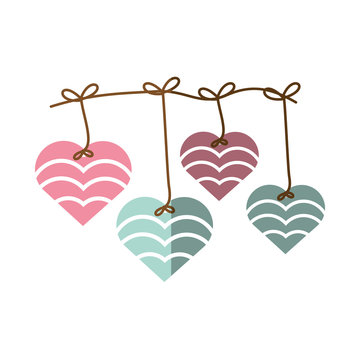 Four decorative hearts in pink, mauve, mint, and teal hanging from a rustic twine string with bows.