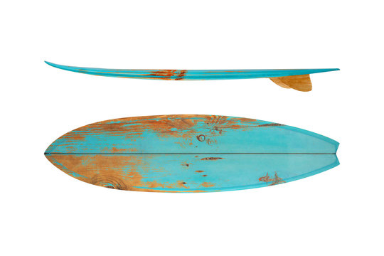 Two vintage-style surfboards with weathered turquoise and rust-colored patina, one top-down and one side view on white background.