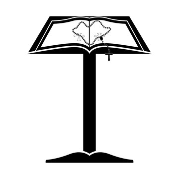 Open book on lectern with heart-shaped rosary beads, symbolizing faith and devotion.
