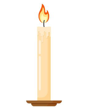 A lit beige wax candle with a bright orange flame, dripping wax, and resting on a brown holder.