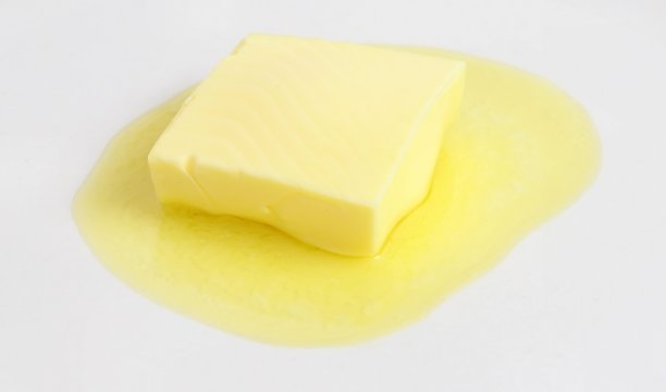 Butter Pat Melting - High-Quality Food Photography for Culinary Sites