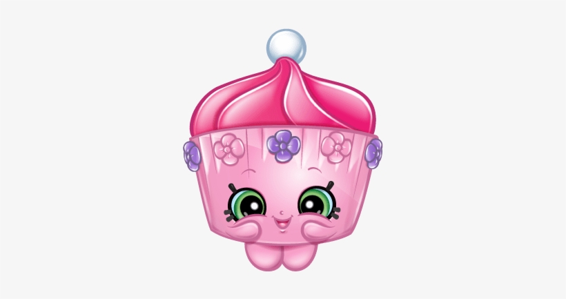 Pink cupcake character with green eyes, purple flowers, and a white pearl on top.