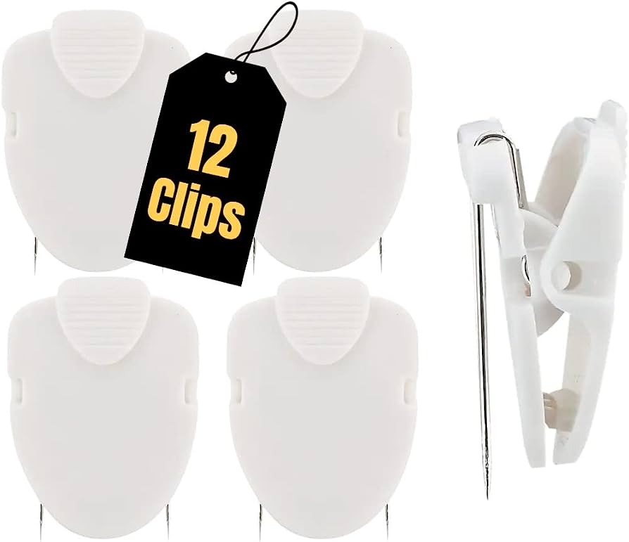 White plastic garment clips with metal pins, 12-pack shown with tag and side view of mechanism.