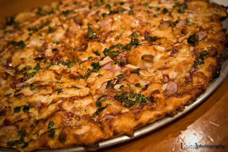 Handcrafted Chicken & Herb Pizza - Freshly Baked & Flavorful