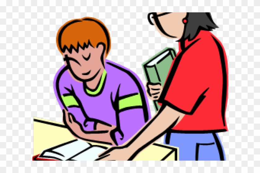 A teacher in red assists a student in purple with reading at a desk, holding a green book.
