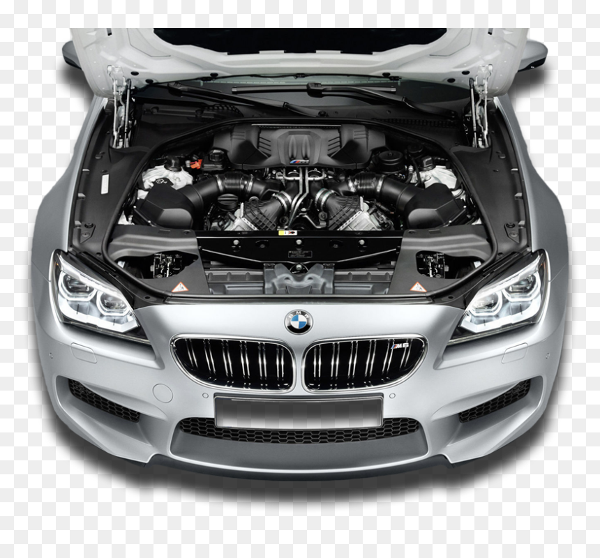 Silver BMW M6 with open hood showcasing twin-turbo V8 engine and carbon fiber components.