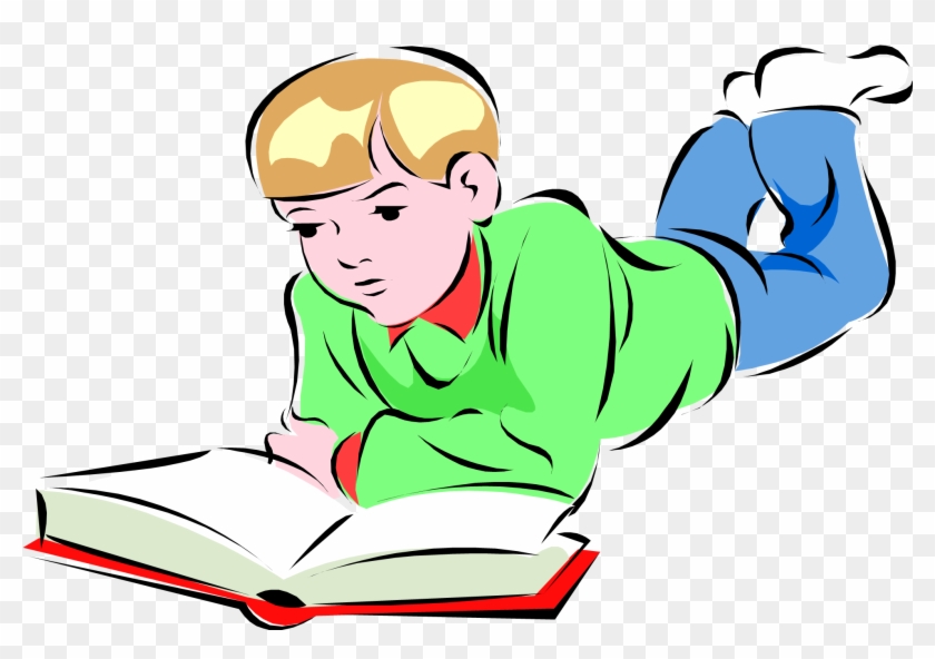 A cartoon boy with blond hair, wearing green shirt and blue pants, lies on his stomach reading an open book.