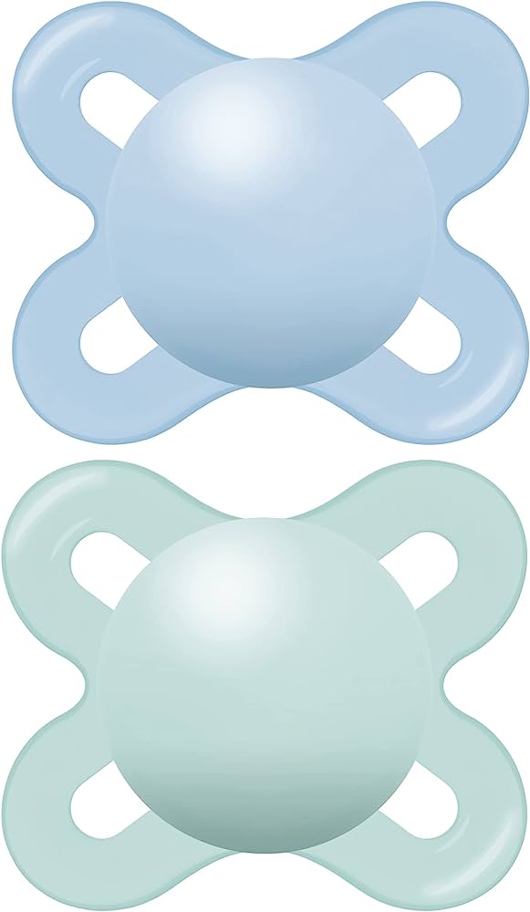 Two silicone baby pacifiers in light blue and mint green, side by side on white background.