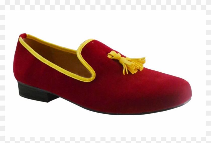 Red velvet loafer with yellow piping and tassel detail, low heel, slip-on style.
