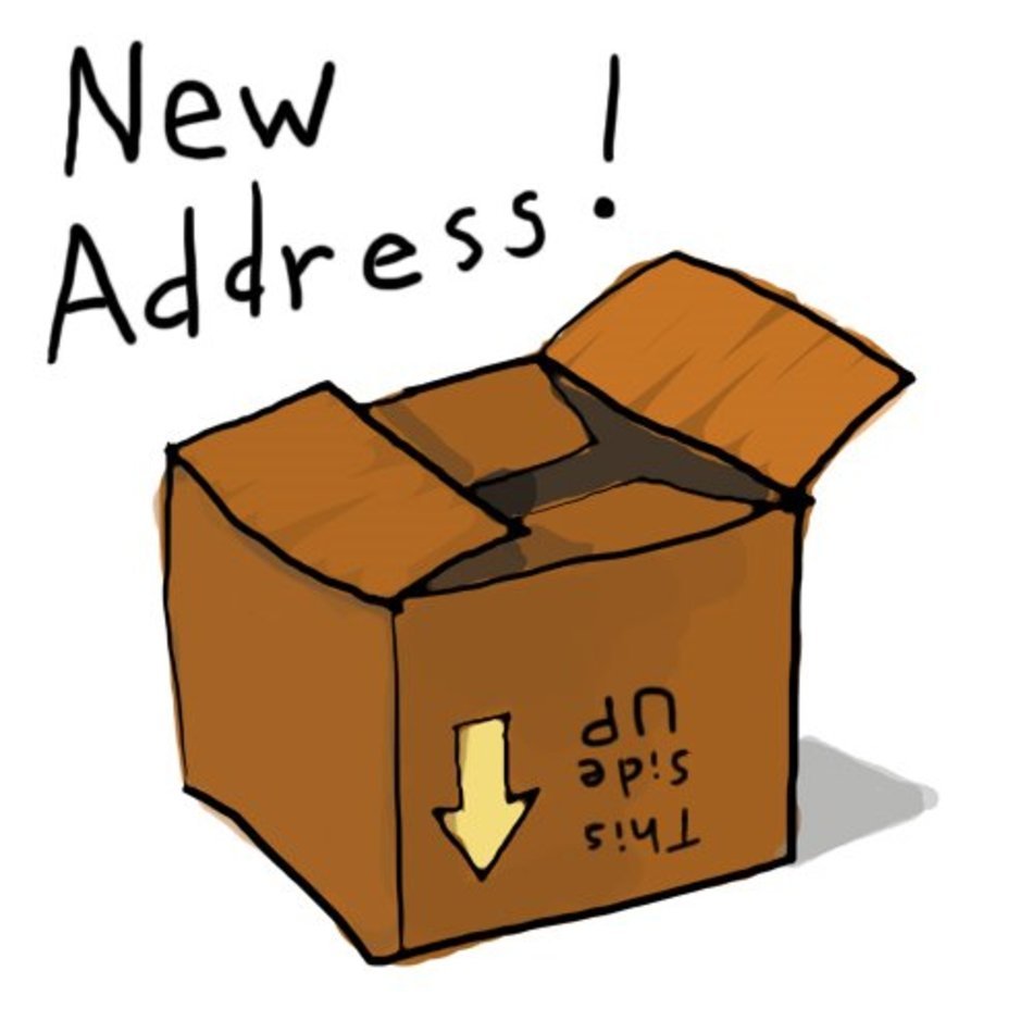 Open cardboard box labeled "This Side Up" with "New Address!" text above.