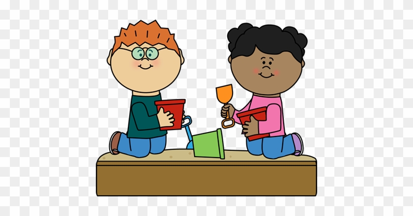Two diverse children playing with sand toys in a sandbox, smiling and sharing tools.